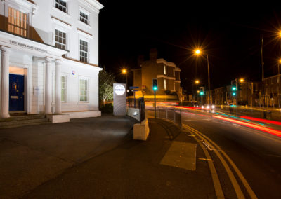 image of the implant experts exterior at night